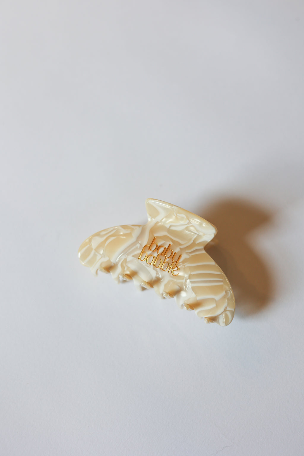 Baby Babble Granola branded hair clip for breastfeeding moms